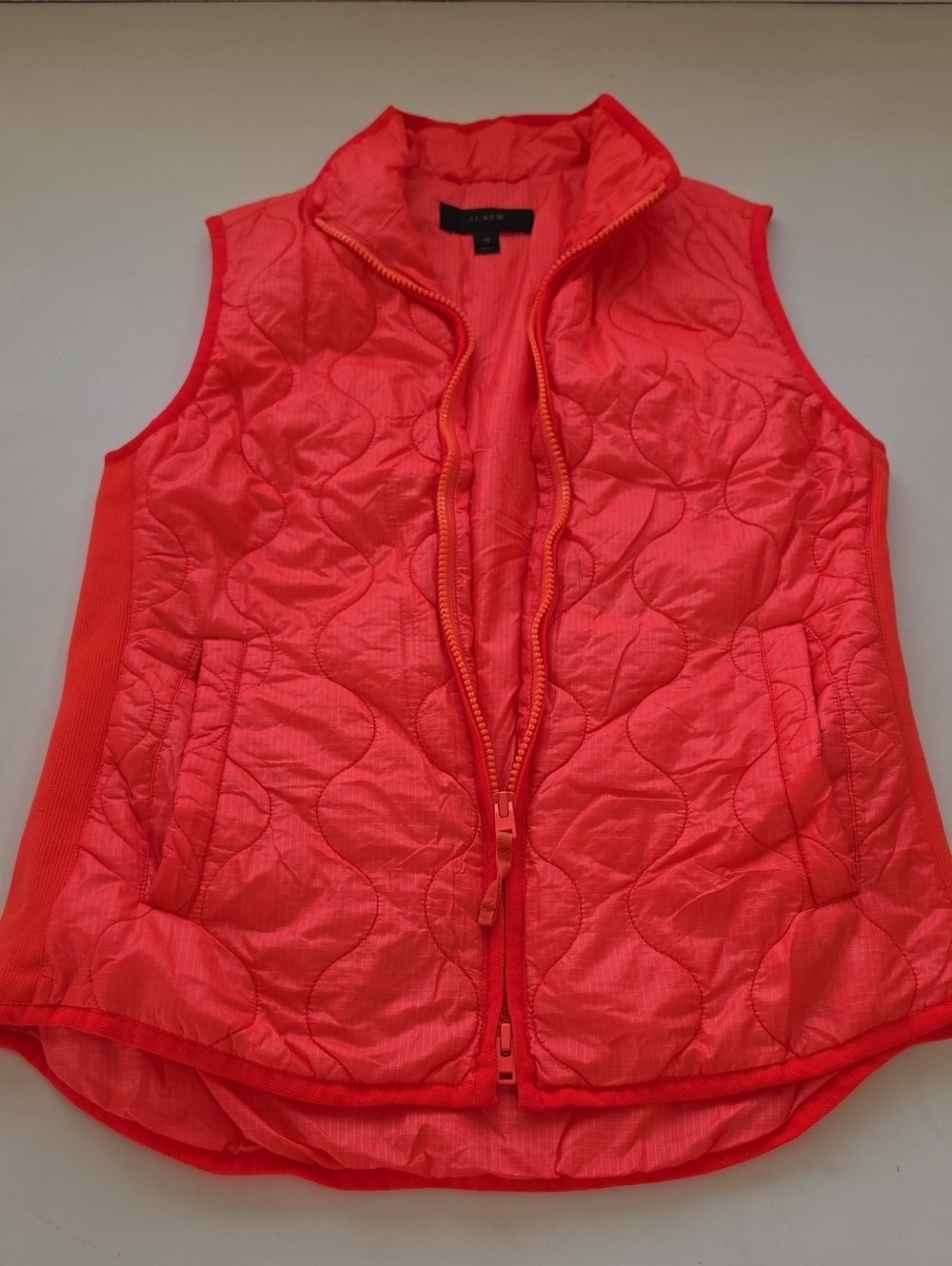 J.Crew featuring a front zipper closure